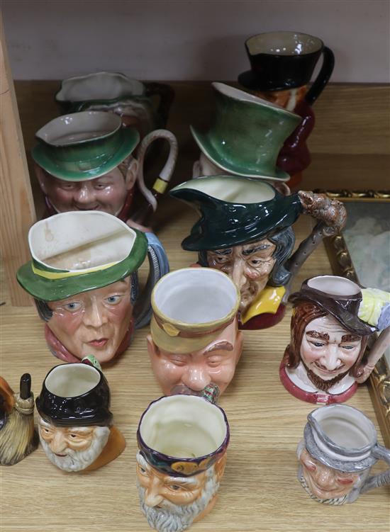 A collection of pottery character jugs